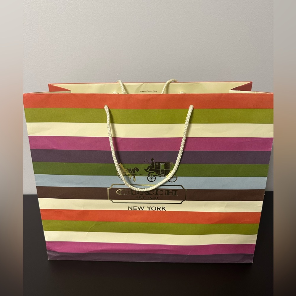 Coach Striped Shopping Bag. Perfect for selling your items for high resale value